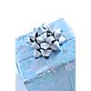 Wrapped christmas gift box close up on white background