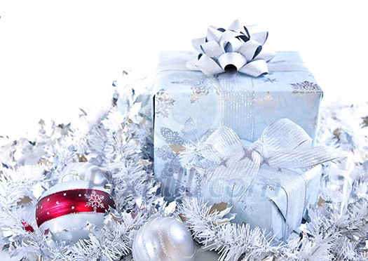 Two gift boxes with Christmas ornaments on white background Two gift boxes with Christmas ornaments on white background