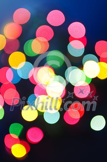 Out of focus multicolored Christmas light background Out of focus multicolored Christmas light background