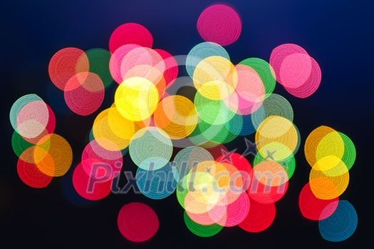 Out of focus multicolored Christmas light background Out of focus multicolored Christmas light background