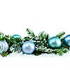 Many Christmas decorations laying in pine branches and snow