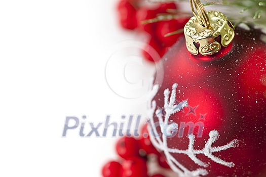 Red Christmas decoration with pine needles with copy space Red Christmas decoration with pine needles with copy space