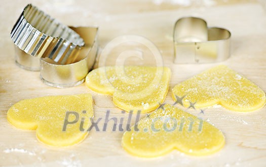 Making heart shaped shortbread cookies with cutters Making heart shaped shortbread cookies with cutters