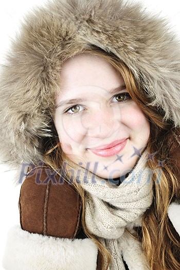 Portrait of beautiful young woman in fur hood of winter coat Portrait of beautiful young woman in fur hood of winter coat