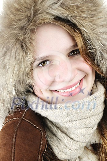 Portrait of beautiful young woman in fur hood of winter coat Portrait of beautiful young woman in fur hood of winter coat