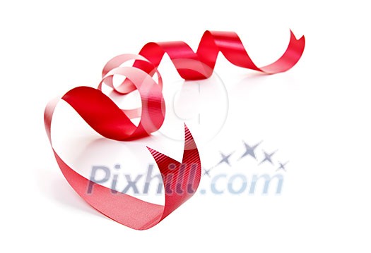 Curled red holiday ribbon strip isolated on white background Curled red holiday ribbon strip isolated on white background