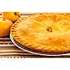 Whole apple pie with apples close up