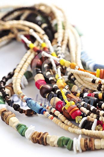Wood and seashell bead necklaces close up Wood and seashell bead necklaces close up