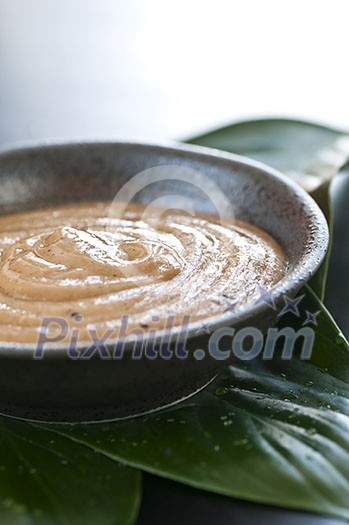 Natural body care green tea scrub closeup Natural body care green tea scrub closeup