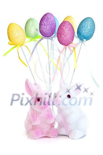 Cute Easter bunny toys and balloons isolated on white background