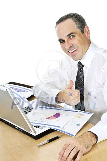 Happy smiling businessman sitting at his desk isolated on white background Happy smiling businessman sitting at his desk isolated on white background