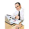 Happy smiling businessman sitting at his desk isolated on white background