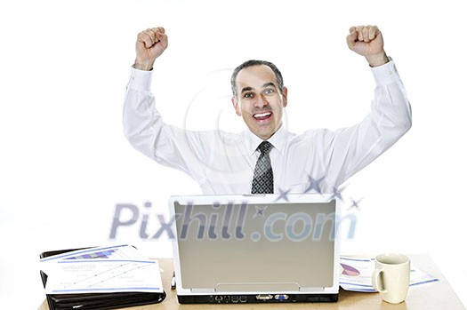 Happy businessman raising his arms sitting at his desk isolated on white background Happy businessman raising his arms sitting at his desk isolated on white background