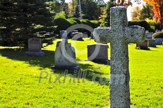 Bright graveyard lawn with ancient tombstone crosses Bright graveyard lawn with ancient tombstone crosses