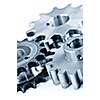 Interlocking industrial metal gears isolated on white