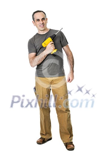 Confident handyman ready to work holding a drill Confident handyman ready to work holding a drill