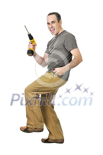 Happy handyman doing a dance with his drill