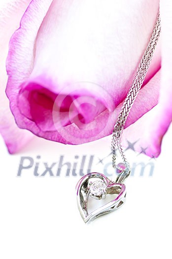 Heart pendant with diamond with a pink rose Heart pendant with diamond with a pink rose