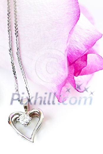 Heart pendant with diamond with a pink rose Heart pendant with diamond with a pink rose