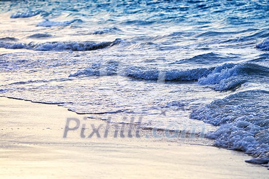 Tropical Caribbean sea waves breaking on the shore Tropical Caribbean sea waves breaking on the shore