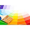 Clean paintbrush on rainbow of color card samples