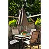 Wooden deck of a house with patio furniture