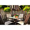 Wooden deck of a house with patio furniture