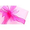 Gift box wrapped in pink paper with ribbon and bow