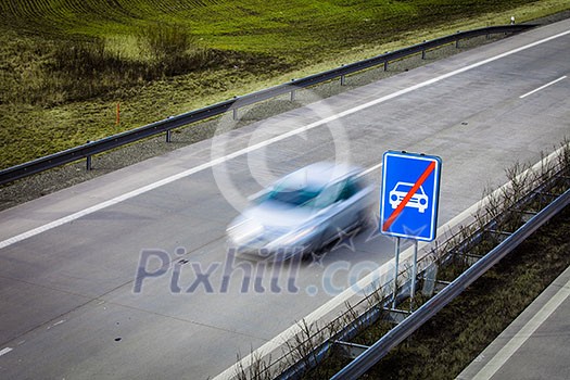 Highway traffic - motion blurred cars on a highway Highway traffic - motion blurred cars on a highway