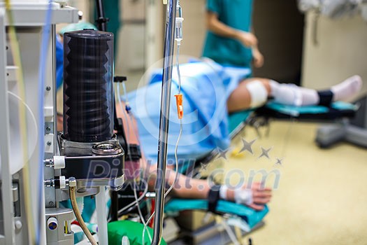 Unidentified boy undergoing a surgery. Focus on the monitor with vital functions Unidentified boy undergoing a surgery. Focus on the monitor with vital functions