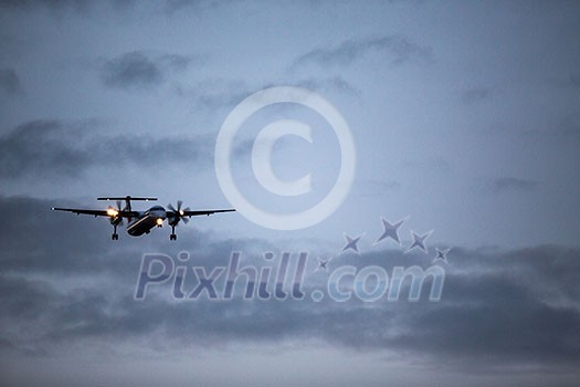 Passenger Airliner flying in the clouds Passenger Airliner flying in the clouds