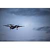 Passenger Airliner flying in the clouds