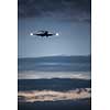 Passenger Airliner flying in the clouds