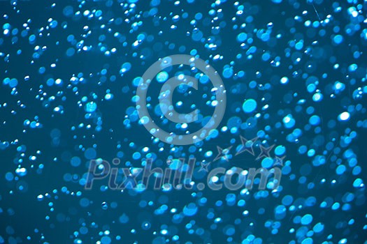 Refreshing blue watery blurry background (shallow DOF; color toned image) Refreshing blue watery blurry background (shallow DOF; color toned image)