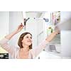Young woman in her lovely, modern kitchen