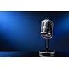 Retro microphone on blue background