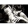 black and white photo of vampire woman bites a blind man