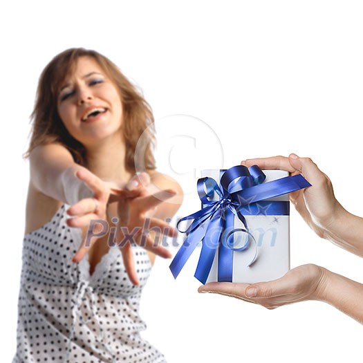 A girl reaching out for men's hands holding a present on white bacground A girl reaching out for men's hands holding a present on white bacground