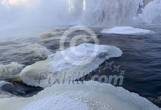 Flowing river scenery in winter Flowing river scenery in winter
