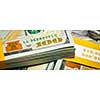 Creative business finance making money concept - letterbox panoramic image of new 100 US dollars 2013 edition banknotes (bills) bundles close up