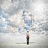 Rear view of businesswoman looking at broken ladder