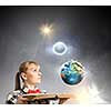 Woman in casual wear holding opened book in hands. Elements of this image are furnished by NASA
