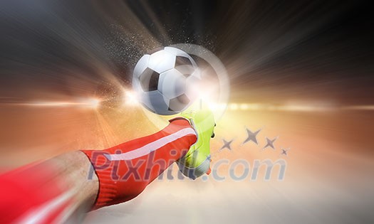 Close up image of footballer foot kicking the ball Close up image of footballer foot kicking the ball