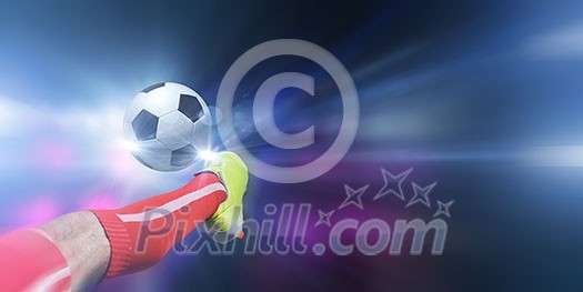 Close up image of footballer foot kicking the ball Close up image of footballer foot kicking the ball