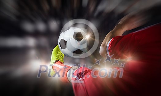 Close up image of footballer foot kicking the ball Close up image of footballer foot kicking the ball
