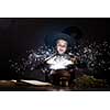 Little Halloween witch reading conjure above pot