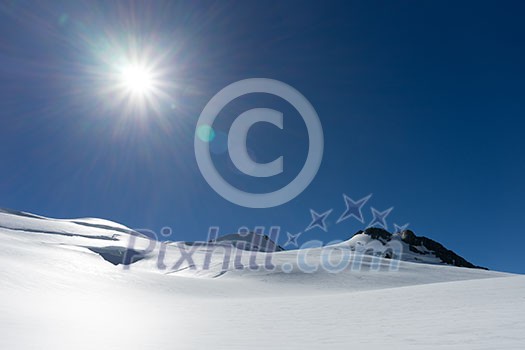 Mountain landscape with snow and clear blue sky Mountain landscape with snow and clear blue sky