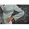 Close up of businesswoman and business sketches at background