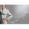 Close up of businesswoman and business sketches on cement wall