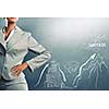 Close up of businesswoman and business sketches on cement wall